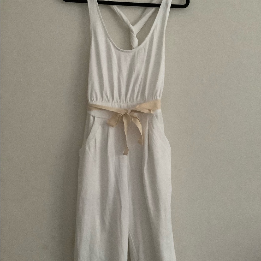 Chic White Jumpsuit with Cream Tie